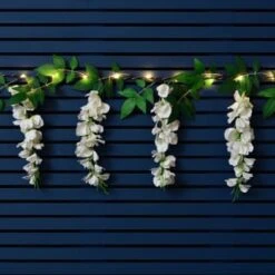 Solar Powered 180cm Artificial Leaf Garland With Wisteria Flowers - Warm White -Garden Furniture Sales 379258 180cm solar powered artificial leaf garland with wisteria flowers 20 warm white micro leds 3