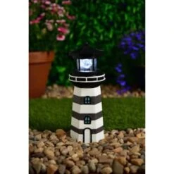 B&M Lighthouse Ornament With Rotating Solar Light - Grey -Garden Furniture Sales 393263 lighthouse ornament with rotating solar light grey
